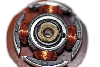 3. Viewed from the top, this brushless dc (BLDC) motor employs four permanent magnets mounted to the top of its rotor, eliminating the need for connections, a commutator, and brushes.