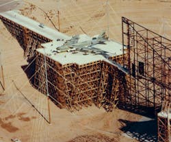1. The Trestle EMP test facility at Kirtland Air Force Base with a B-52 in test position. 1. The Trestle EMP test facility at Kirtland Air Force Base with a B-52 in test position.