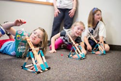 1. Girl Scouts in the Daisy and Brownie age group can earn three badges each in mechanical engineering. Pictured here are some homemade catapults, but the GS has also partnered with Goldieblox to use kits to complete roller coasters and airplane challenges. 1. Girl Scouts in the Daisy and Brownie age group can earn three badges each in mechanical engineering. Pictured here are some homemade catapults, but the GS has also partnered with Goldieblox to use kits to complete roller coasters and airplane challenges.