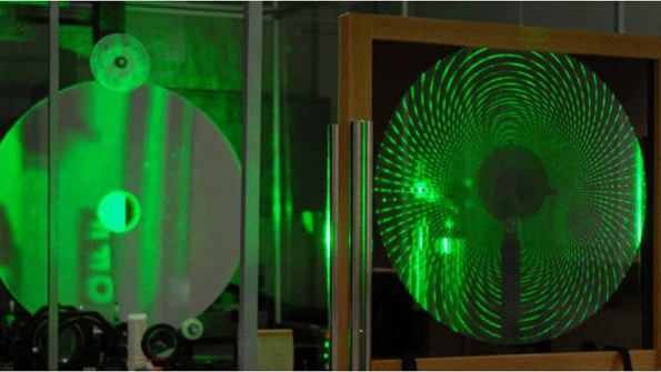 MOIRE is a groundbased experiment of a GEObased system that uses a lightweight membrane optic etched with a diffractive pattern Images courtesy of DARPA