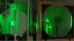MOIRE is a ground-based experiment of a GEO-based system that uses a lightweight membrane optic etched with a diffractive pattern. (Images courtesy of DARPA)