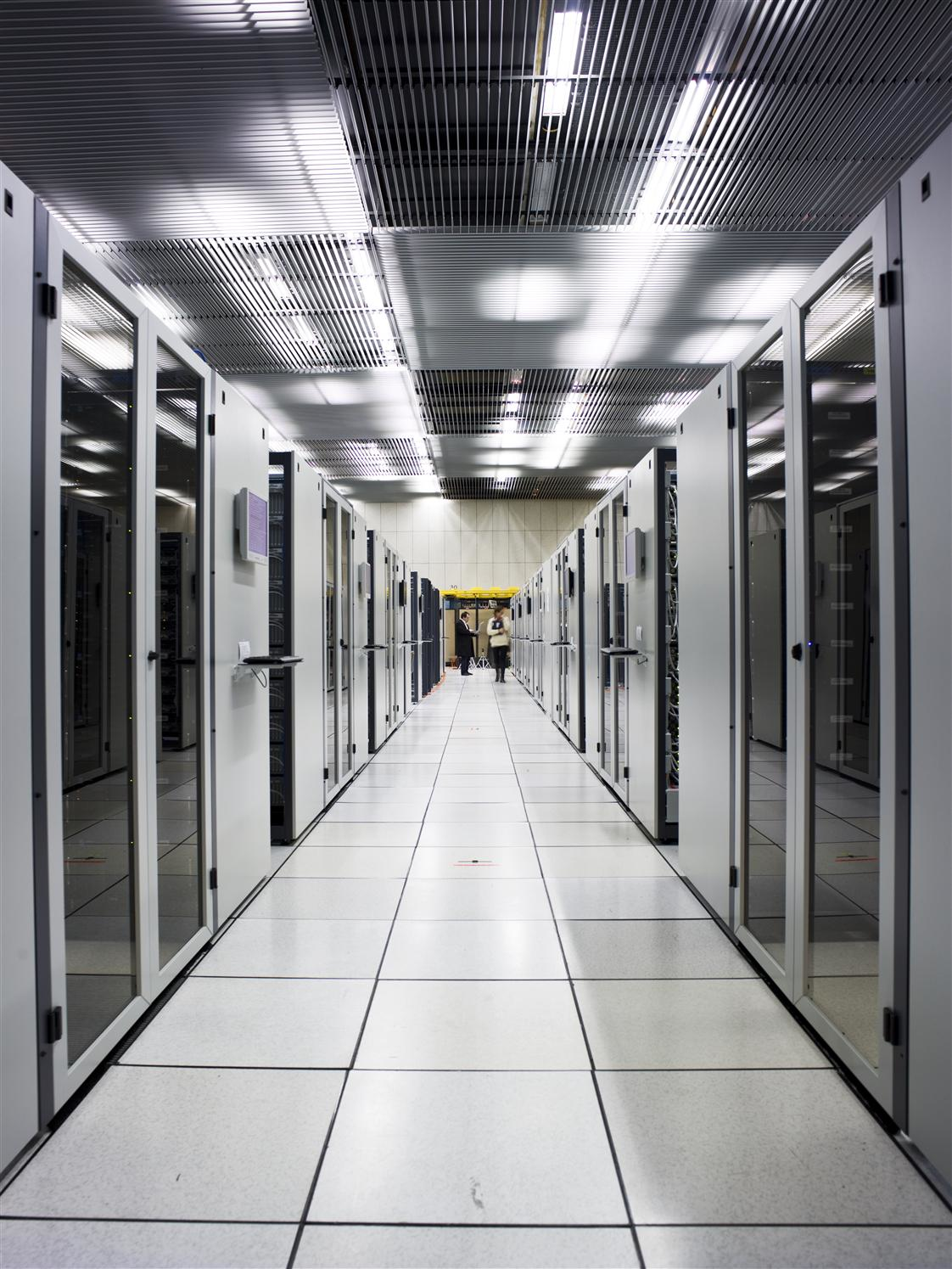 Servers at the headquarters of the European Organization for Nuclear Research CERN Fujitsu Laboratories and systemonchip designer Socionext have built a transceiver that could speed up data transfers between optical modules and semiconductor chips used in servers and switches Image courtesy of CERN