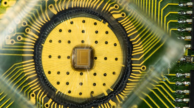 The phase-change memory chip on a circuit board. (Image courtesy of IBM Research).
