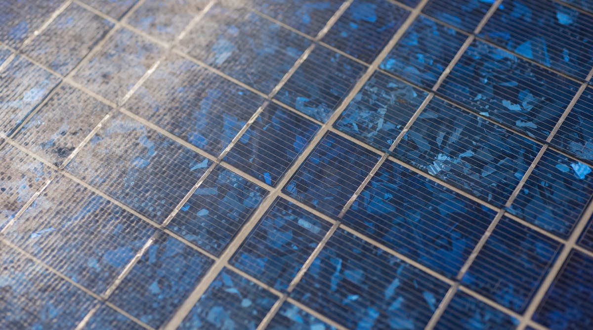 A close-up image of solar panel. Mass-produced silicon solar cells are typically less than 20% efficient, but a new multi-junction device has demonstrated an efficiency of 29.8%. (Image courtesy of Thinkstock).
