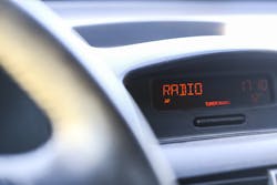 Closeup of car dashboard display with word radio Closeup of car dashboard display with word radio