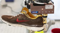 With the DON system, a robot can perform novel tasks like look at a shoe it has never seen before and successfully grab it by its tongue. (Photo: Tom Buehler/CSAIL)