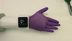 1. An electronic glove, or e-glove, developed by Purdue University researchers can be worn over a prosthetic hand to provide humanlike softness, warmth, appearance, and sensory perception. (Source: Purdue University)