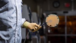 GaN and GaAs 6-in. diameter semiconductor wafers are part of a foundry that serves both military and commercial customers. (Courtesy of BAE Systems) GaN and GaAs 6-in. diameter semiconductor wafers are part of a foundry that serves both military and commercial customers. (Courtesy of BAE Systems)