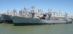 Tesla has acquired three mothballed freighters from the Navy&apos;s Reserve Fleet and converted them into a floating, vertically integrated production facility for its lithium batteries. (Credit: By Earthpig - Own work, CC BY-SA 3.0, https://commons.wikimedia.org/w/index.php?curid=15900615)