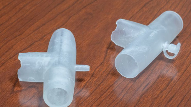 3. Northwell Health doctors turned BiPAP machines into backup ventilators by fitting them with these 3D-printed adapters. (Photo: Northwell Health)
