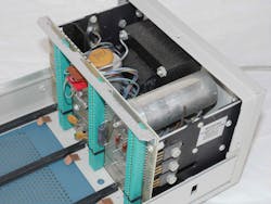 3. The TM503 has a linear power supply in the back that feeds dc and low-voltage ac power to the plug-in modules. 3. The TM503 has a linear power supply in the back that feeds dc and low-voltage ac power to the plug-in modules.