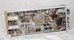 6. The component side of the FG502 function generator PCB has several LM741 operational amplifiers in sockets, as well as other power-supply and signal-path components. 6. The component side of the FG502 function generator PCB has several LM741 operational amplifiers in sockets, as well as other power-supply and signal-path components.