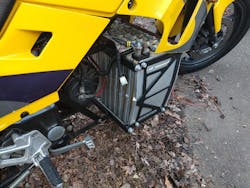 2. A close-up of the eNinja's original battery stack shows the damage that occurred during a charging mishap. The charger didn’t have protection against reverse current flow, so it almost completely discharged the cells when its power was interrupted for several days. Note to self: Look into adding an output diode or some other protection circuit to the charger before riding season… 2. A close-up of the eNinja's original battery stack shows the damage that occurred during a charging mishap. The charger didn’t have protection against reverse current flow, so it almost completely discharged the cells when its power was interrupted for several days. Note to self: Look into adding an output diode or some other protection circuit to the charger before riding season…