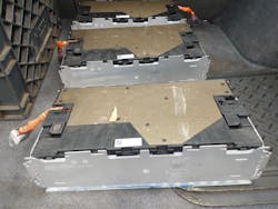 3. Behold 6 kWh worth of factory-fresh lithium-packed goodness! Now all I have to do is cobble up a harness for the battery manager, build a couple of 100-A primary power cables, and fabricate a support bracket to secure the whole mess within the eNinja's frame. 3. Behold 6 kWh worth of factory-fresh lithium-packed goodness! Now all I have to do is cobble up a harness for the battery manager, build a couple of 100-A primary power cables, and fabricate a support bracket to secure the whole mess within the eNinja's frame.