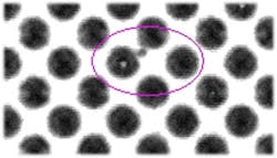 2. Two voids lie among these solder bumps. 2. Two voids lie among these solder bumps.