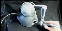 4. A specialized “joystick” control arm is used for precise steering of the mirrors and beam. (Source: Wyss Institute/Harvard University) 4. A specialized “joystick” control arm is used for precise steering of the mirrors and beam. (Source: Wyss Institute/Harvard University)