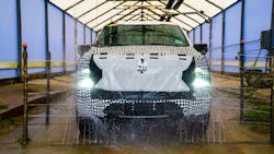 A prototype Ford F-150 Lightning undergoes salt and mud bath wash to test long-term exposure of salt and mud on the truck’s military-grade aluminum alloy body. A prototype Ford F-150 Lightning undergoes salt and mud bath wash to test long-term exposure of salt and mud on the truck’s military-grade aluminum alloy body.