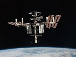 2. The Space Shuttle (top of image) docks with the ISS. (Image from Reference 2) 2. The Space Shuttle (top of image) docks with the ISS. (Image from Reference 2)