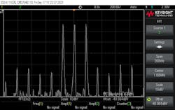 6. This oscilloscope screen capture shows a triple tone test in the frequency domain. 6. This oscilloscope screen capture shows a triple tone test in the frequency domain.