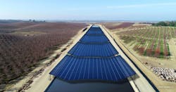 Project Nexus will explore the feasibility of using solar arrays to reduce evaporative losses in California&apos;s 4000-mile water distribution canal system. This conceptual rendering shows a solar canopy spanning the 110-foot-wide TID Main Canal.