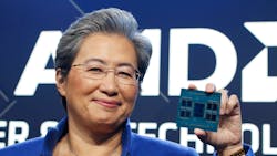 CEO Lisa Su displays a Bergamo CPU during the keynote at AMD&rsquo;s data center and AI technology event.