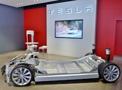 This image of a Tesla chassis and battery pack provides some idea of the space limitations in many EV applications as well as the large scale of battery packs—dual realities that shape current monitoring. This image of a Tesla chassis and battery pack provides some idea of the space limitations in many EV applications as well as the large scale of battery packs—dual realities that shape current monitoring.
