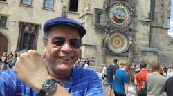 The author (wearing a Speedmaster) at the Prague astronomical clock, a medieval astronomical clock attached to the Old Town Hall in the capital of the Czech Republic.