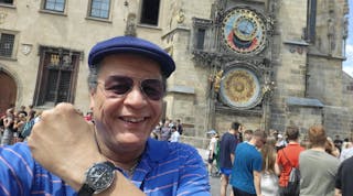 The author (wearing a Speedmaster) at the Prague astronomical clock, a medieval astronomical clock attached to the Old Town Hall in the capital of the Czech Republic.
