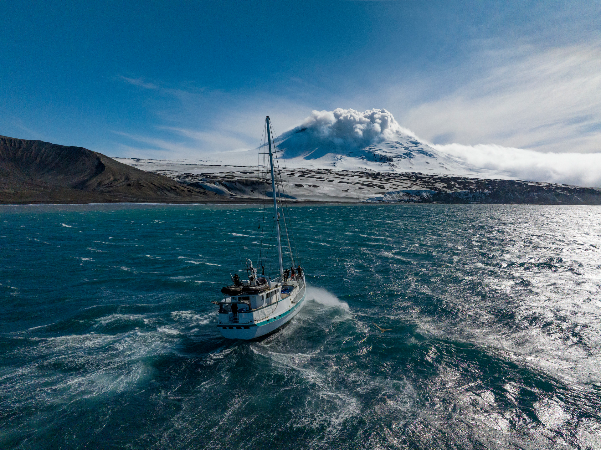 The entire research group headed to that landmass, aka Mt. Michael.