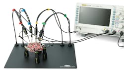 Sensepeek’s PCBite consists of a metal base, spring-loaded magnetic standoffs, and arms to hold probes. Sensepeek’s PCBite consists of a metal base, spring-loaded magnetic standoffs, and arms to hold probes.