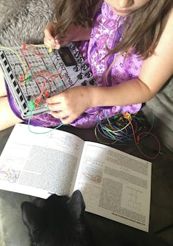 4. Andy's 8-year-old Minion programming the THAT Analog Laptop Computer. 4. Andy's 8-year-old Minion programming the THAT Analog Laptop Computer.