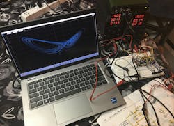 7. The breadboarded implementation of Horowitz & Hill's Lorenz Attractor circuit 7. The breadboarded implementation of Horowitz & Hill's Lorenz Attractor circuit
