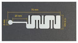 3. Photo of laser-engraved paper microfluidic channel. 3. Photo of laser-engraved paper microfluidic channel.