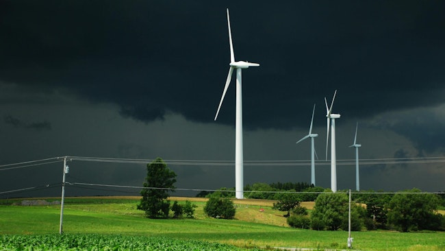 Wind turbines in approaching storm