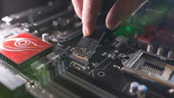 Focus at SSD slot, type M.2 with support for NVMe, on computer motherboard. Focus at SSD slot, type M.2 with support for NVMe, on computer motherboard.