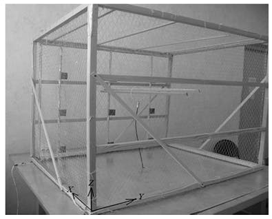 Scale model of a building that has walls with a reinforcing mesh and reinforced concrete