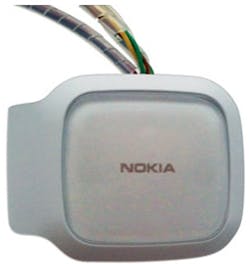 Figure 5. After soldering all of the wires, the cover is replaced on the modified headset. Figure 5. After soldering all of the wires, the cover is replaced on the modified headset.