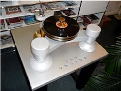 Figure 4. Replacing the 25-year-old Goldmund Reference I, the Goldmund Reference II adds three Teflon tubes to damp wire vibration and a digital processor for RIAA correction. At a cost of $300,000, it may be the world’s most expensive turntable. Figure 4. Replacing the 25-year-old Goldmund Reference I, the Goldmund Reference II adds three Teflon tubes to damp wire vibration and a digital processor for RIAA correction. At a cost of $300,000, it may be the world’s most expensive turntable.