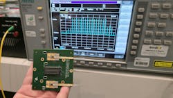 Transmitters and receivers are in the foreground; the oscilloscope shows the 16 wavelength channels on one fiber Transmitters and receivers are in the foreground; the oscilloscope shows the 16 wavelength channels on one fiber