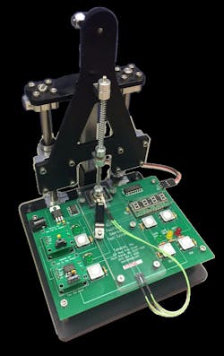 Desktop loading fixture with a known load cell reference Desktop loading fixture with a known load cell reference