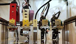 Lineup of tools in the final configuration of the proposed multimodal, multimaterial extrusion system Lineup of tools in the final configuration of the proposed multimodal, multimaterial extrusion system