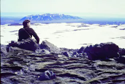 Icelandic Glaciological Society member, Árni Kjartansson, sits overlooking a glacier in Iceland. (Archival Materials Courtesy of Andri Snær Magnason) Icelandic Glaciological Society member, Árni Kjartansson, sits overlooking a glacier in Iceland. (Archival Materials Courtesy of Andri Snær Magnason)