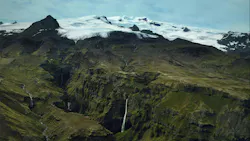 A glacial tongue behind a waterfall. A glacial tongue behind a waterfall.