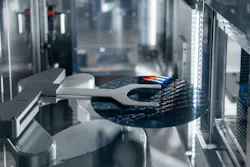 4. Display of a manufactured wafer in Infineon’s 300-mm cleanroom. 4. Display of a manufactured wafer in Infineon’s 300-mm cleanroom.