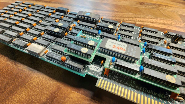 This is a Sigma Designs Color400 ISA graphics card. I kept it because I feel like it&rsquo;s a work of art. I also thought, if any of those chips stopped working, the whole thing is cooked. Could I 3D-print new ones in the future?