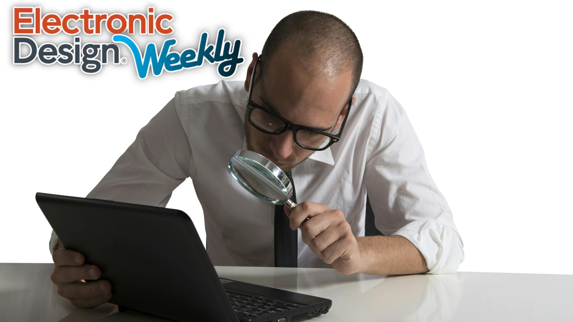 Looking at a laptop with magnifying glass