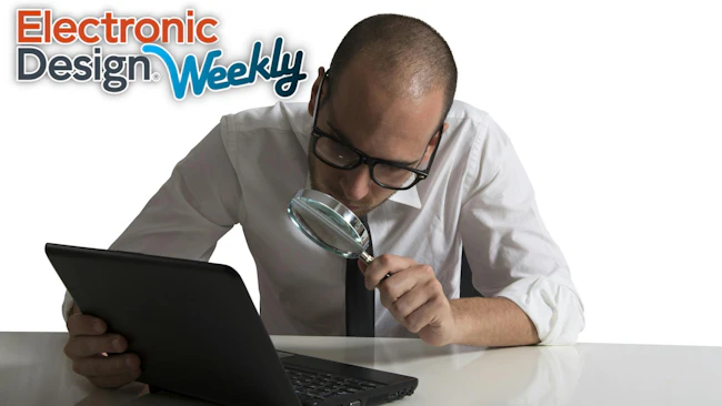 Looking at a laptop with magnifying glass