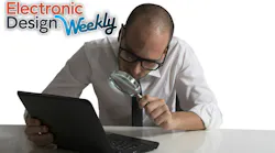 Looking at a laptop with magnifying glass