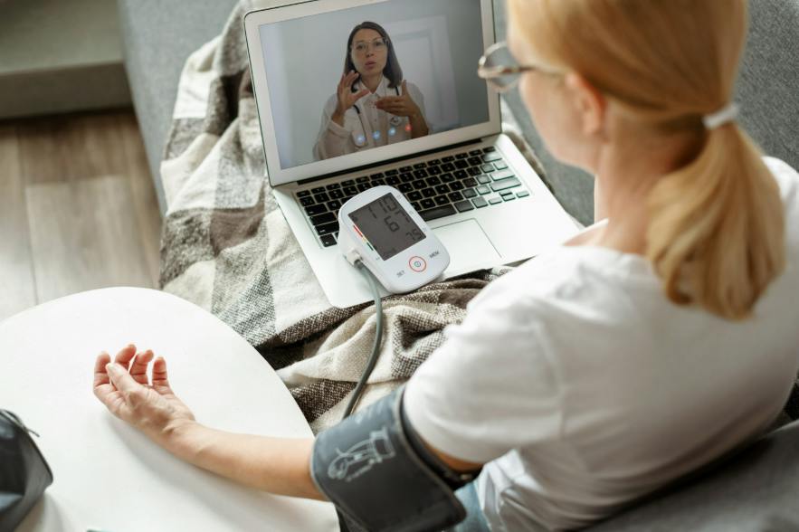 Figure 1: By offering continuous measurement of vital signs using IoMT devices, such as a blood pressure cuff, doctors develop a fuller picture of their patients&rsquo; condition. (Source: Oksana Klymenko/stock.adobe.com)